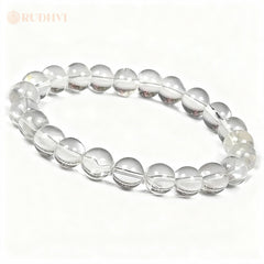 Clear quartz bracelet on a white background with 'RUDHVI' branding.