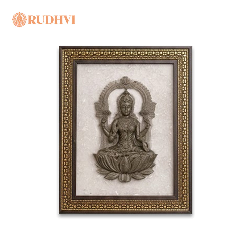 Close up of selenite crystal frame with pyrite Lakshmi Ji idol
