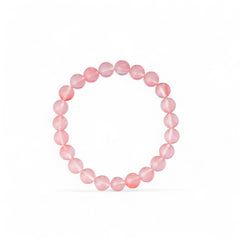 Rose quartz bracelet on a white background