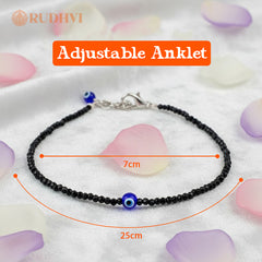 Close-up of Black Tourmaline Beads with Blue Evil Eye Charm – Rudhvi Anklet