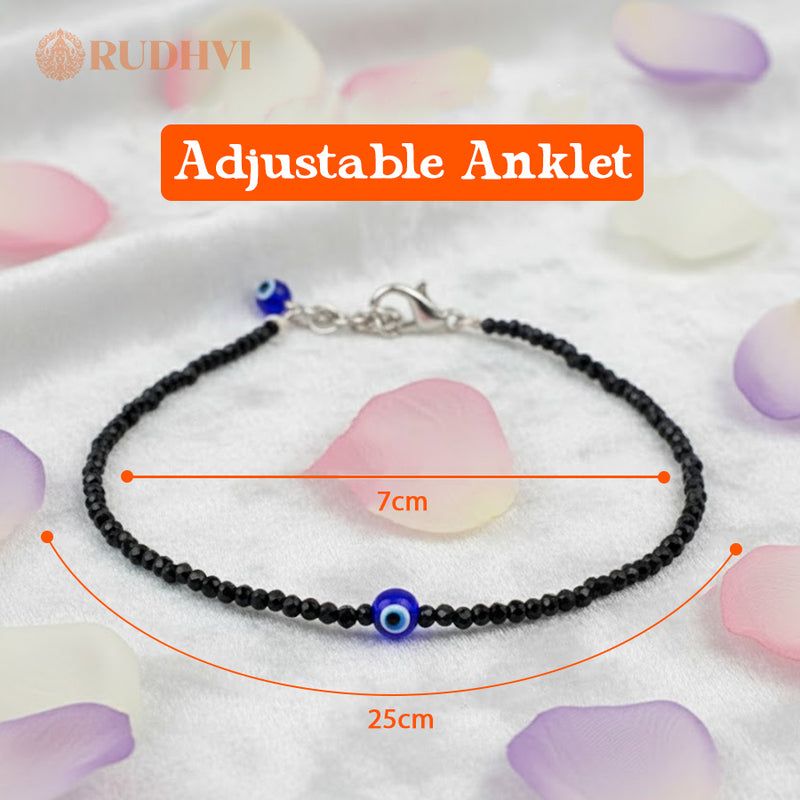 Close-up of Black Tourmaline Beads with Blue Evil Eye Charm – Rudhvi Anklet