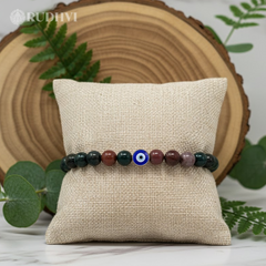 Close-up of Bloodstone evil eye bracelet