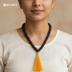 Karungali mala worn around the neck for spiritual protection and deep meditation