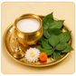 दूध और बिल्व पत्र अर्पण