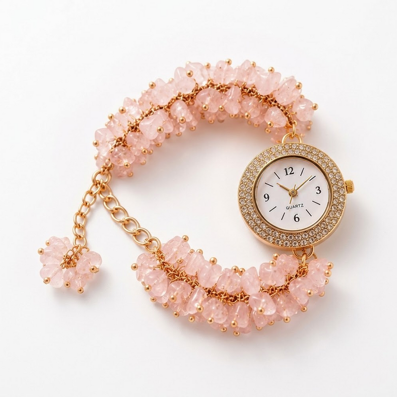  Feminine pink crystal bracelet watch with rose quartz stones and luxury styling.