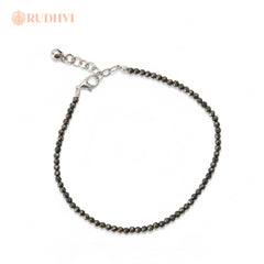 Flatlay of Original Pyrite Anklet for Prosperity-Rudhvi